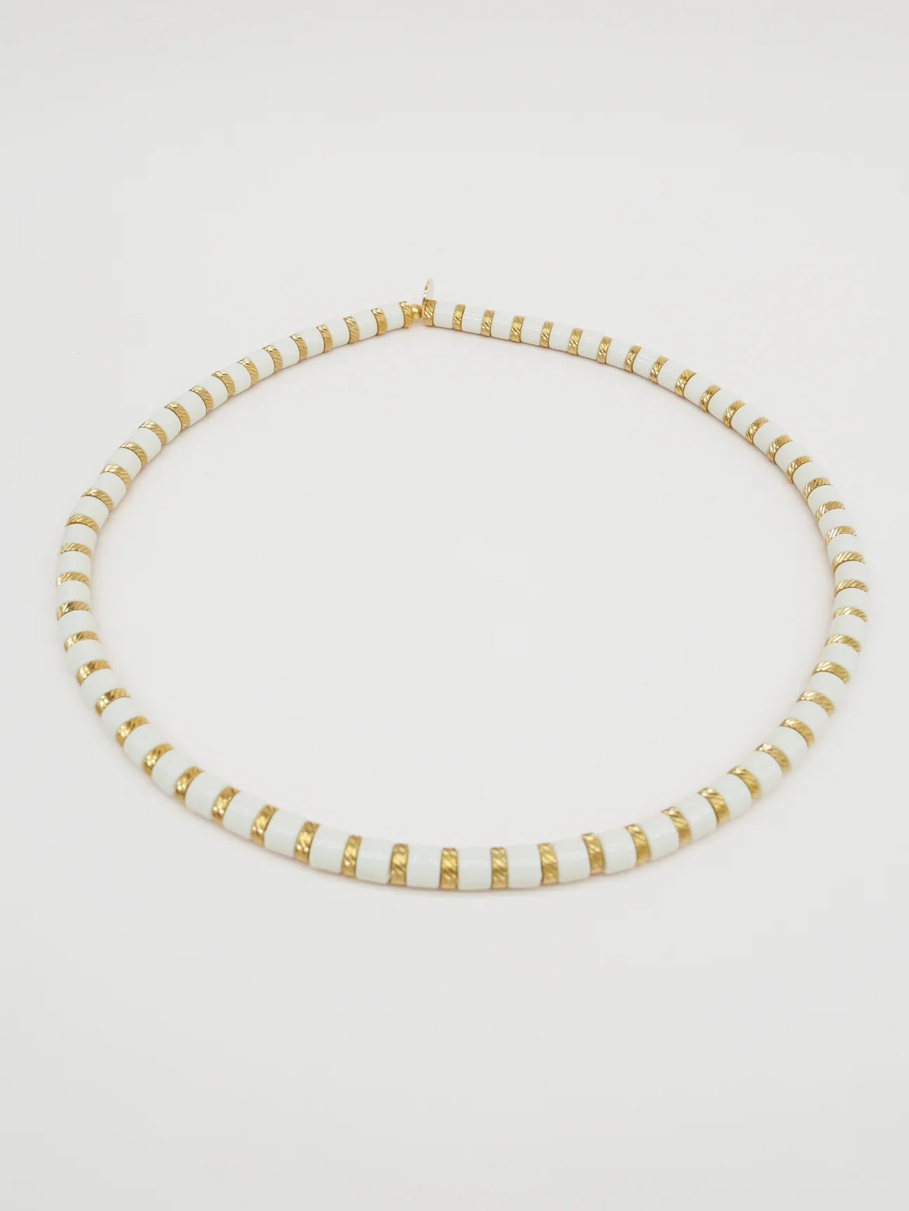 Bichou striped in color and gold