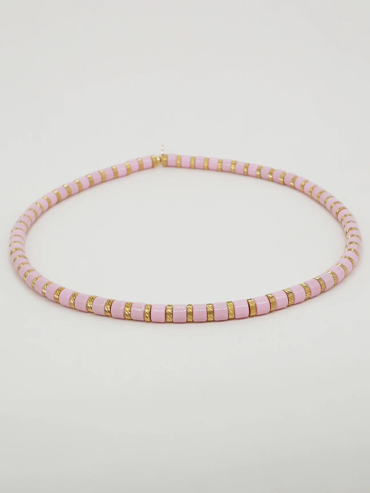 Bichou striped in color and gold