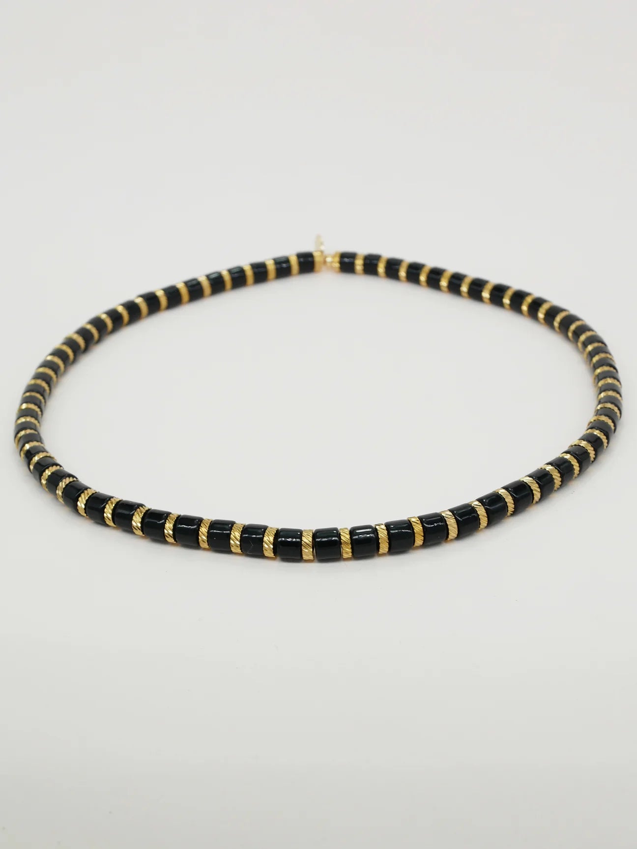 Bichou striped in color and gold