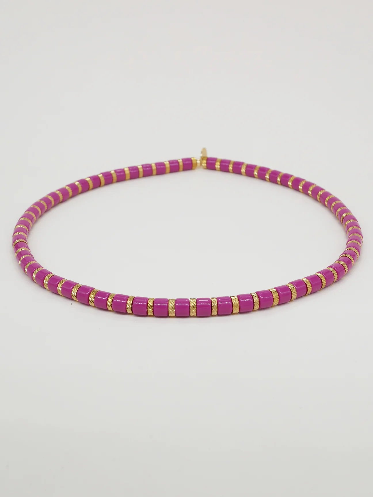 Bichou striped in color and gold