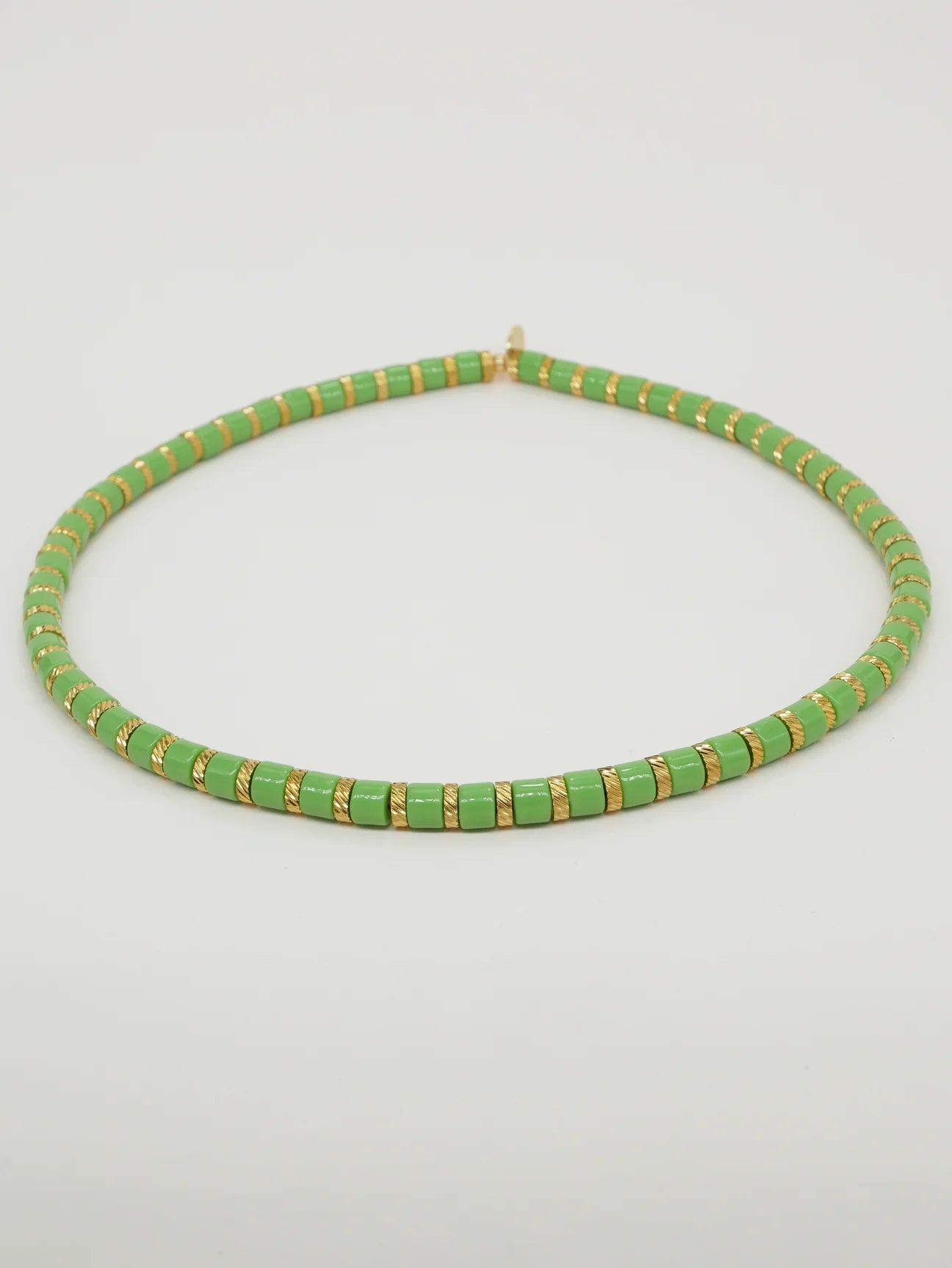 Bichou striped in color and gold