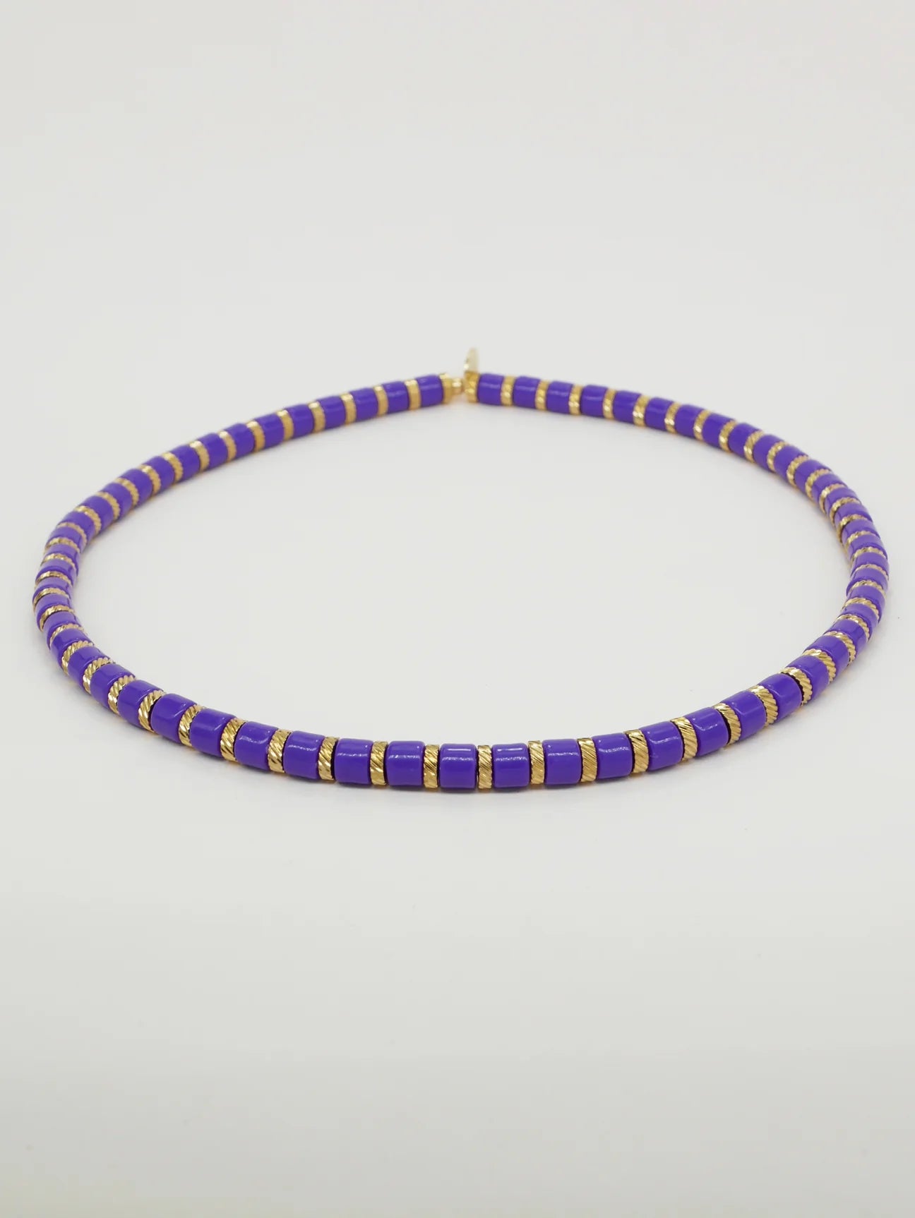 Bichou striped in color and gold